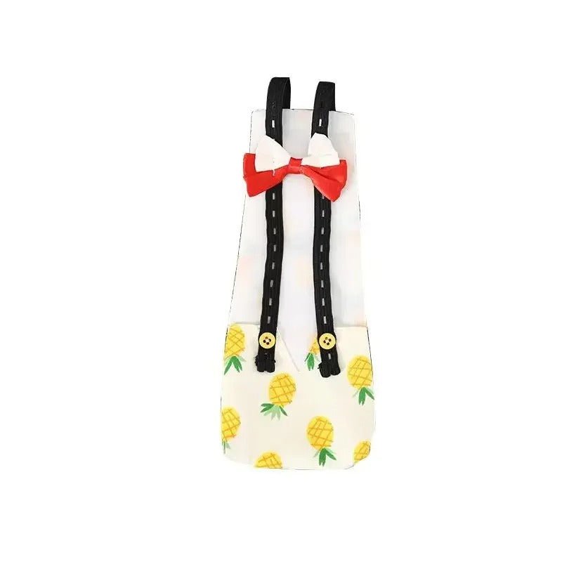 Banana Ducks Diaper with pineapple pattern and suspenders on a white background