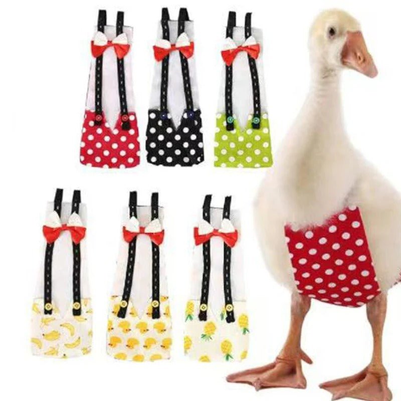 Duck wearing a red polka dot skirt diaper with suspenders and a bow tie, surrounded by similar accessories on a white background. Made for Banana Ducks